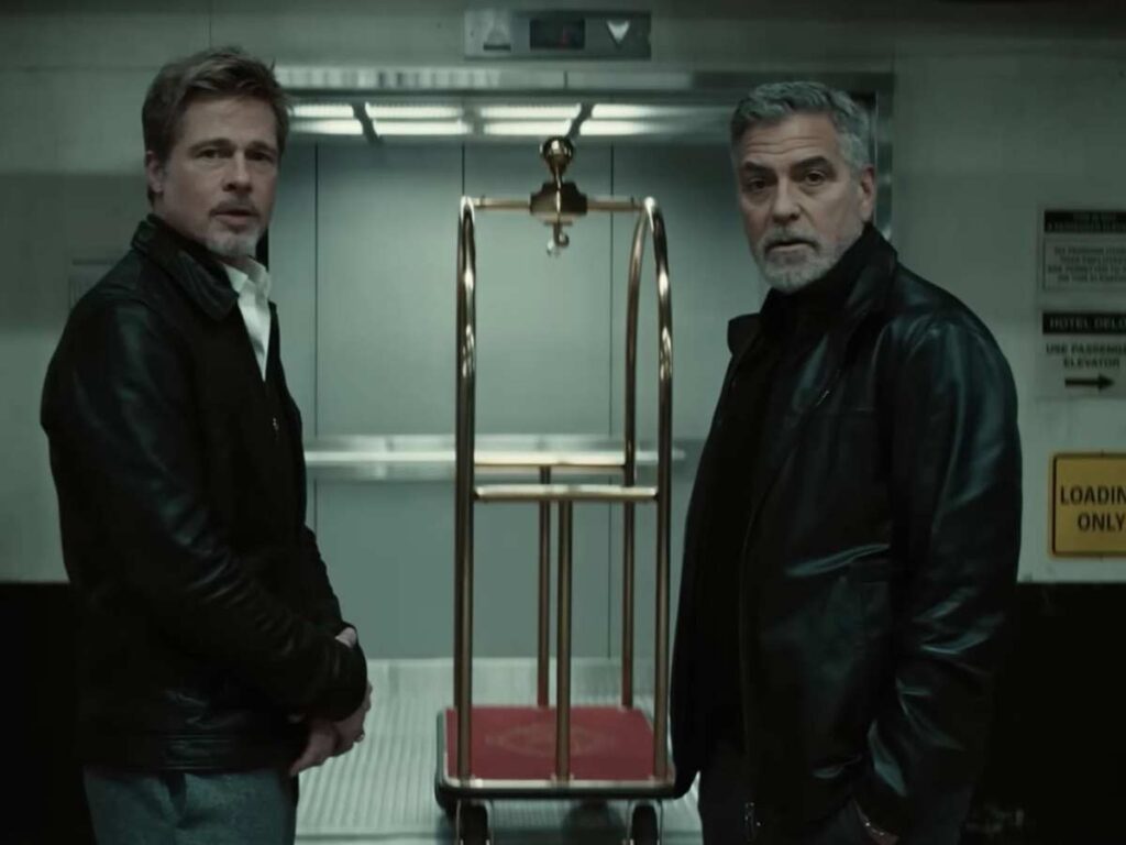 Brad Pitt e George Clooney nel film Wolfs